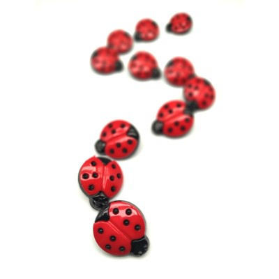 Botón en forma mariquita roja
