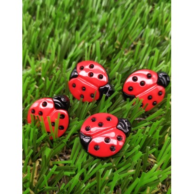 Botón en forma mariquita roja