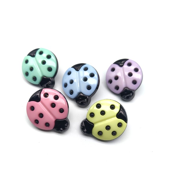 Ladybug shaped button in pastel colors