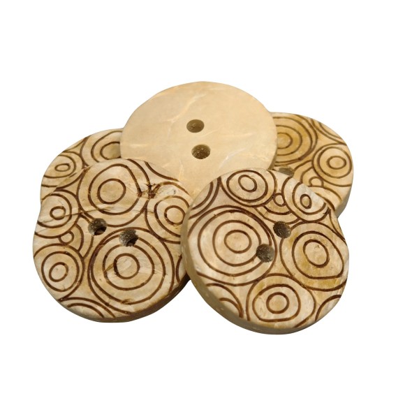 Cercles de boutons de noix de coco blancs