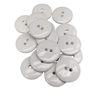 White buttons, two holes