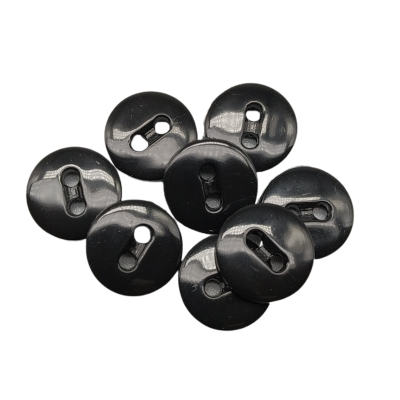 Bottoni bianchi, due fori